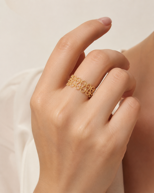 CARV. gold open lace ring worn on hand for everyday outfit styling