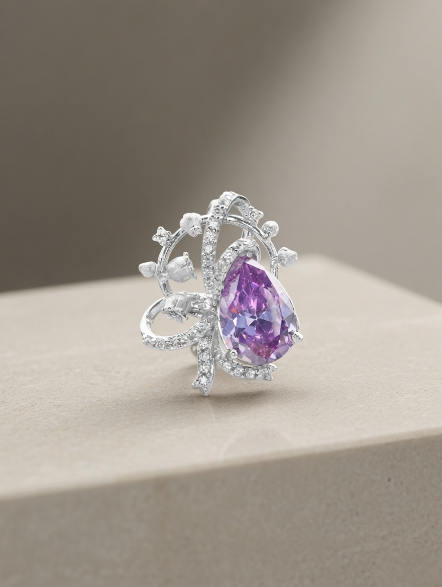 CARV. silver lavender bow pendant necklace with purple pear-cut stone and pavé ribbon detail product display