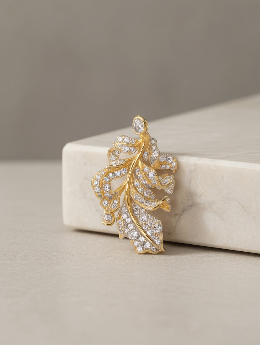 CARV. gold leaf pendant necklace with pavé crystals and open leaf silhouette product display