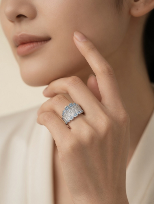 CARV. silver feather statement ring worn on hand for elegant outfit styling