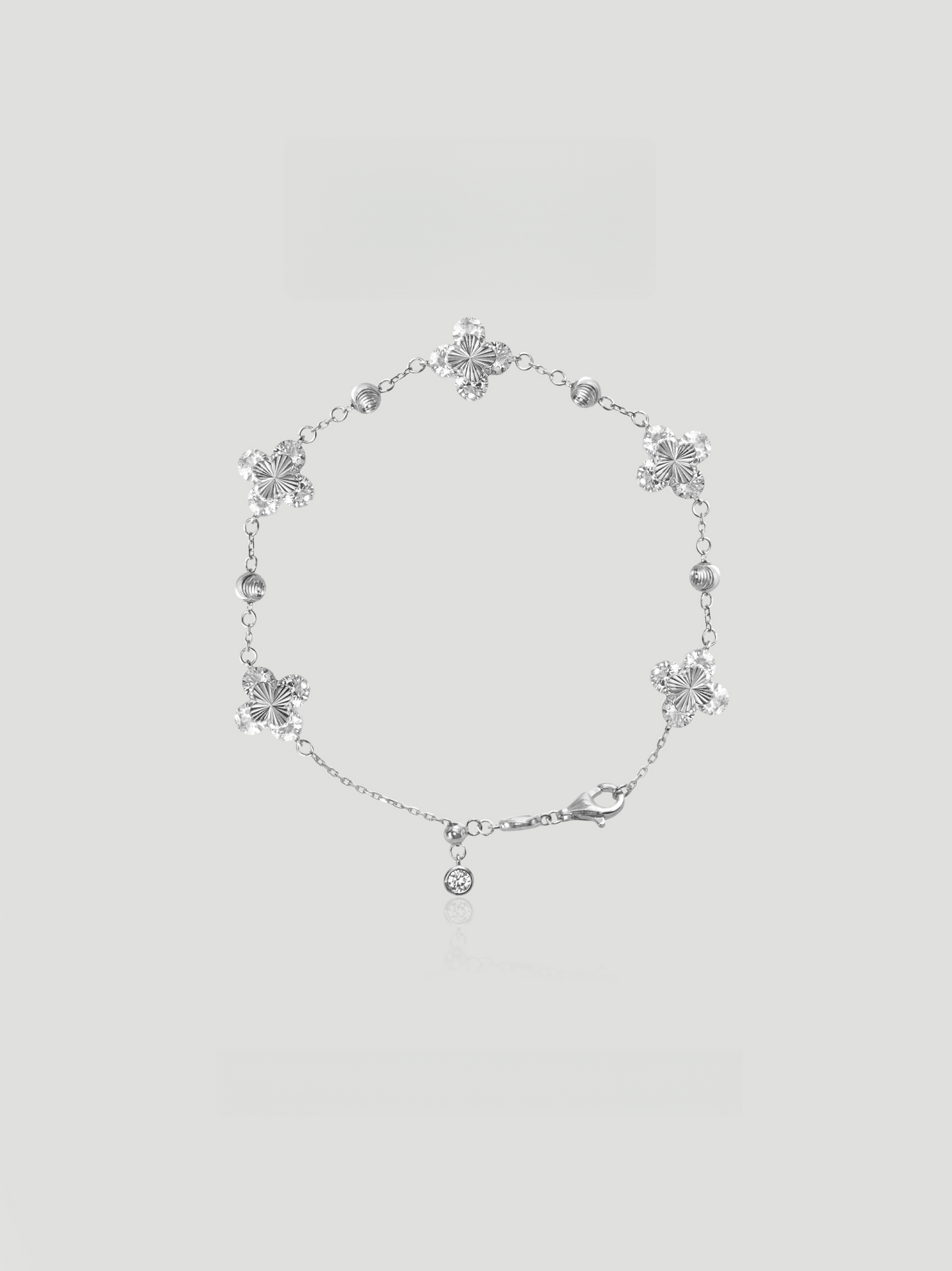 CARV. silver clover bracelet with crystal clover charms, round bead accents and adjustable chain