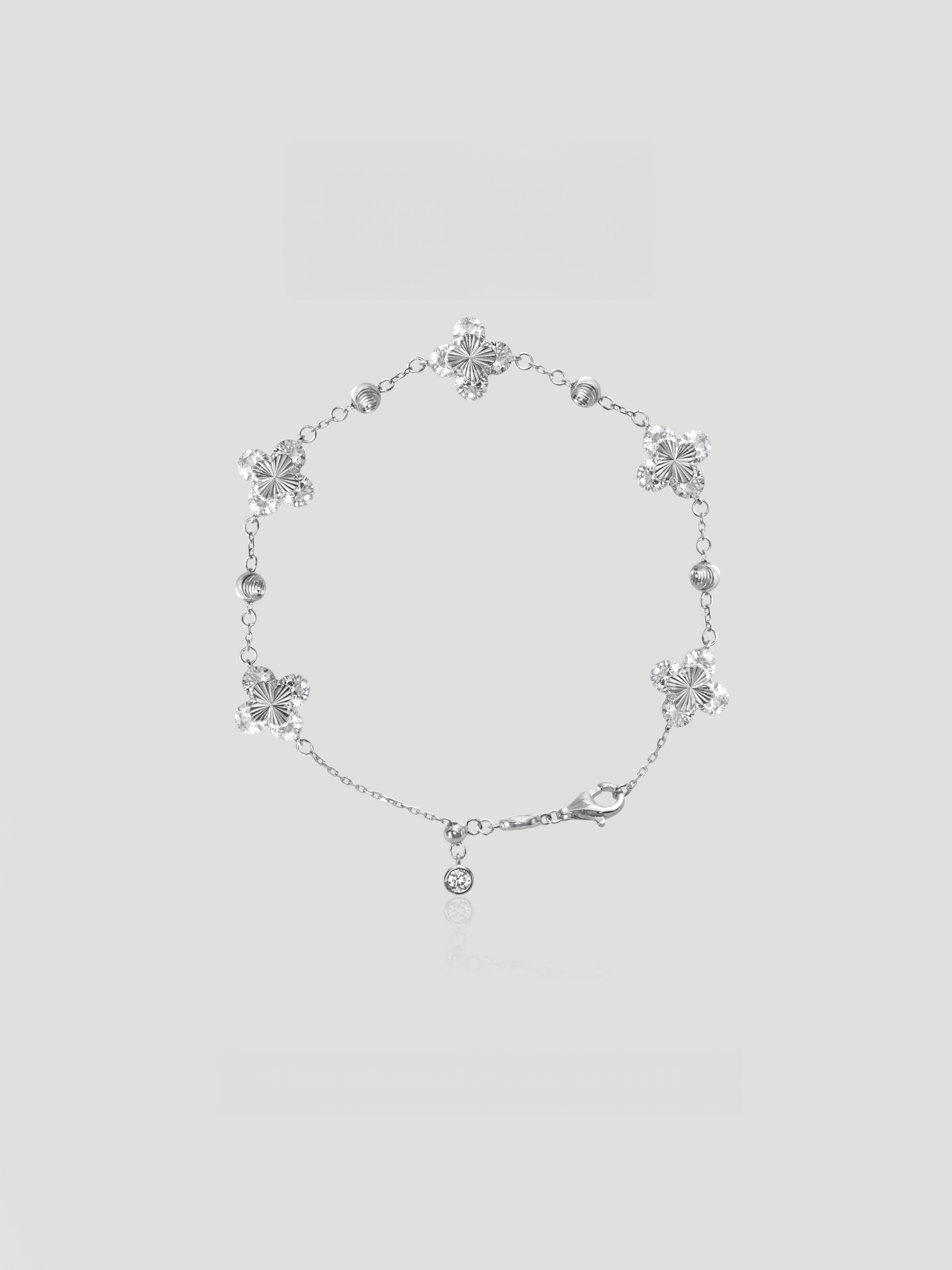 CARV. silver clover bracelet with crystal clover charms, round bead accents and adjustable chain