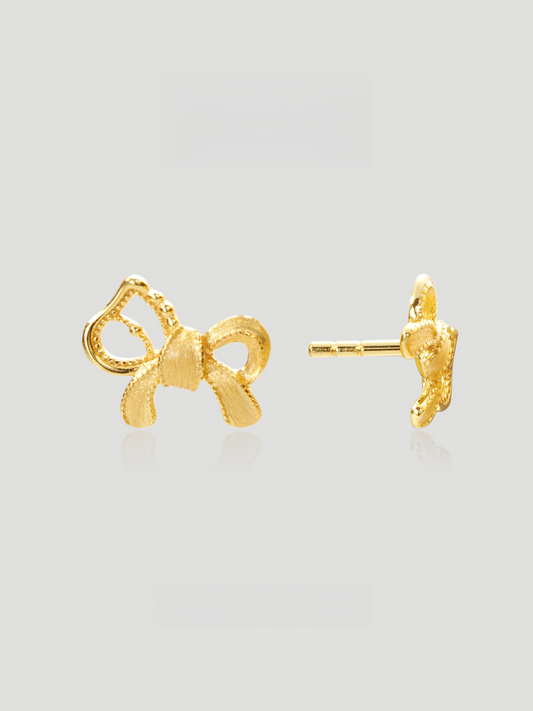 CARV. gold bow stud earrings with sculptural ribbon shape, pavé detail and polished post back