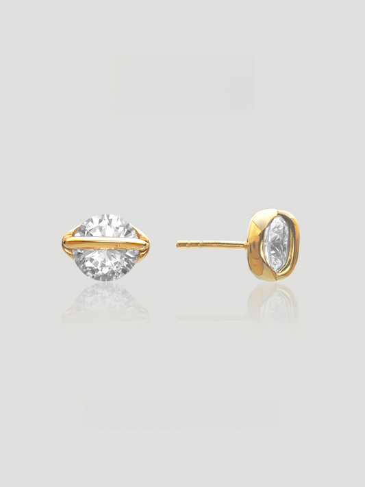 CARV. gold round crystal orbit stud earrings with large clear crystal, gold bezel setting and orbit bar detail