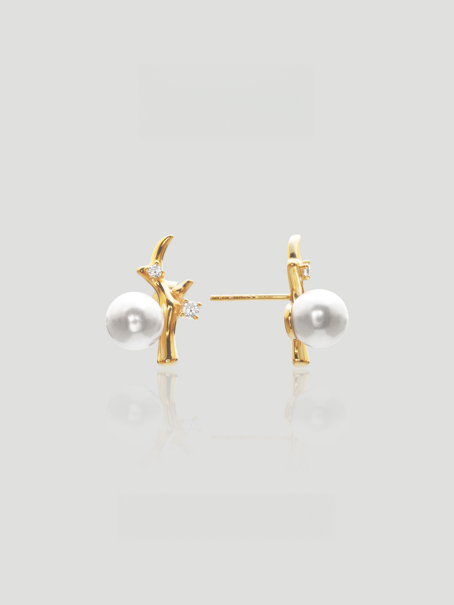 CARV. gold pearl branch stud earrings with white pearl, branch motif and clear crystal accents