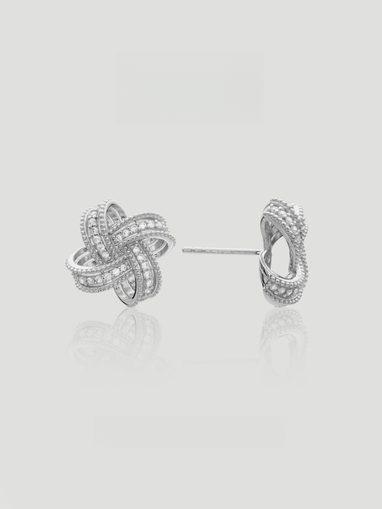 CARV. silver pavé loop stud earrings with layered curved bands and crystal detailing