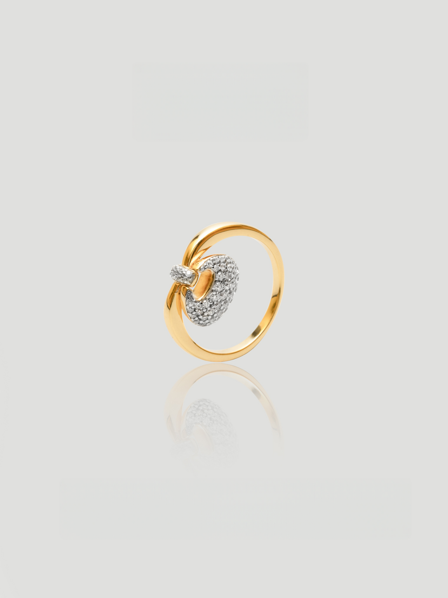 CARV. gold bag charm ring with sculptural round handle design and pavé stone detail