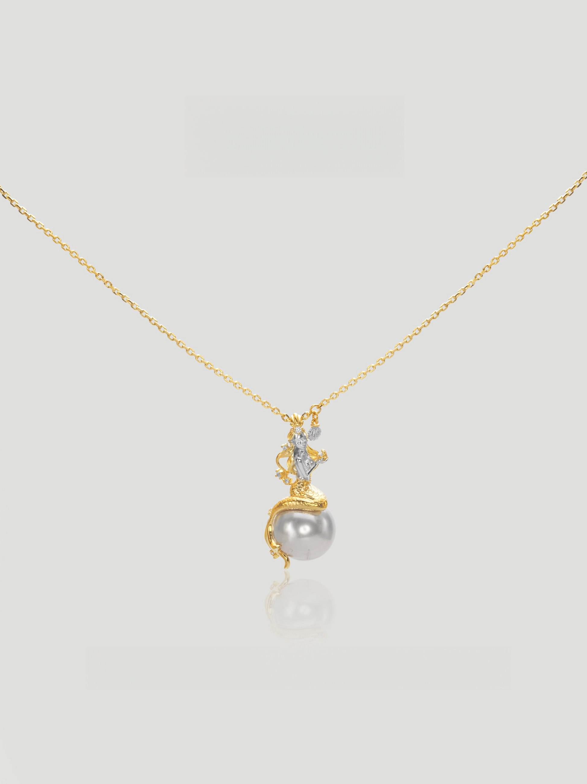 CARV. gold pearl pendant necklace with grey pearl drop, zircon accent and fine chain detail