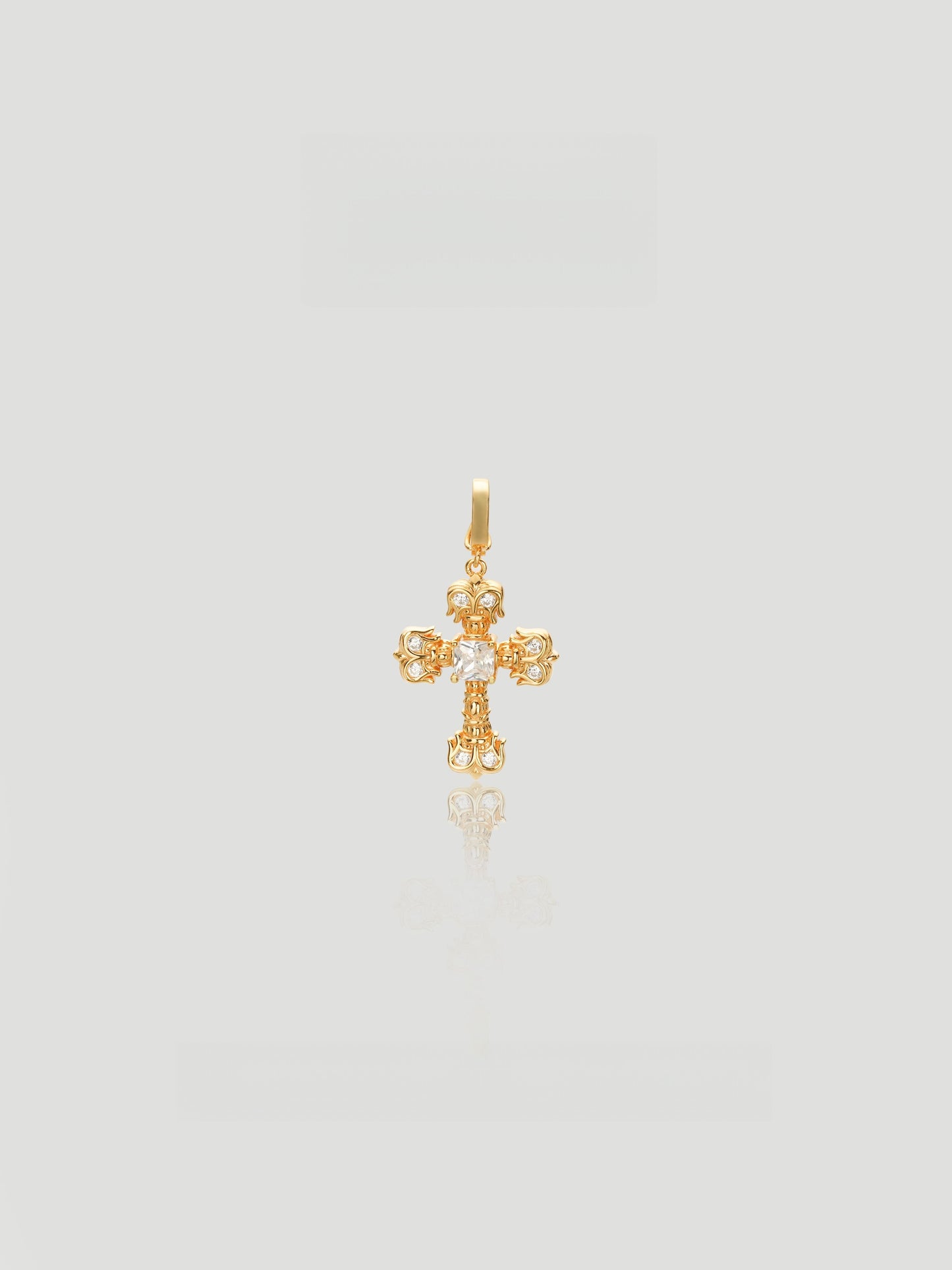 CARV. gold crystal cross pendant necklace with ornate cross design and round stone cluster detail