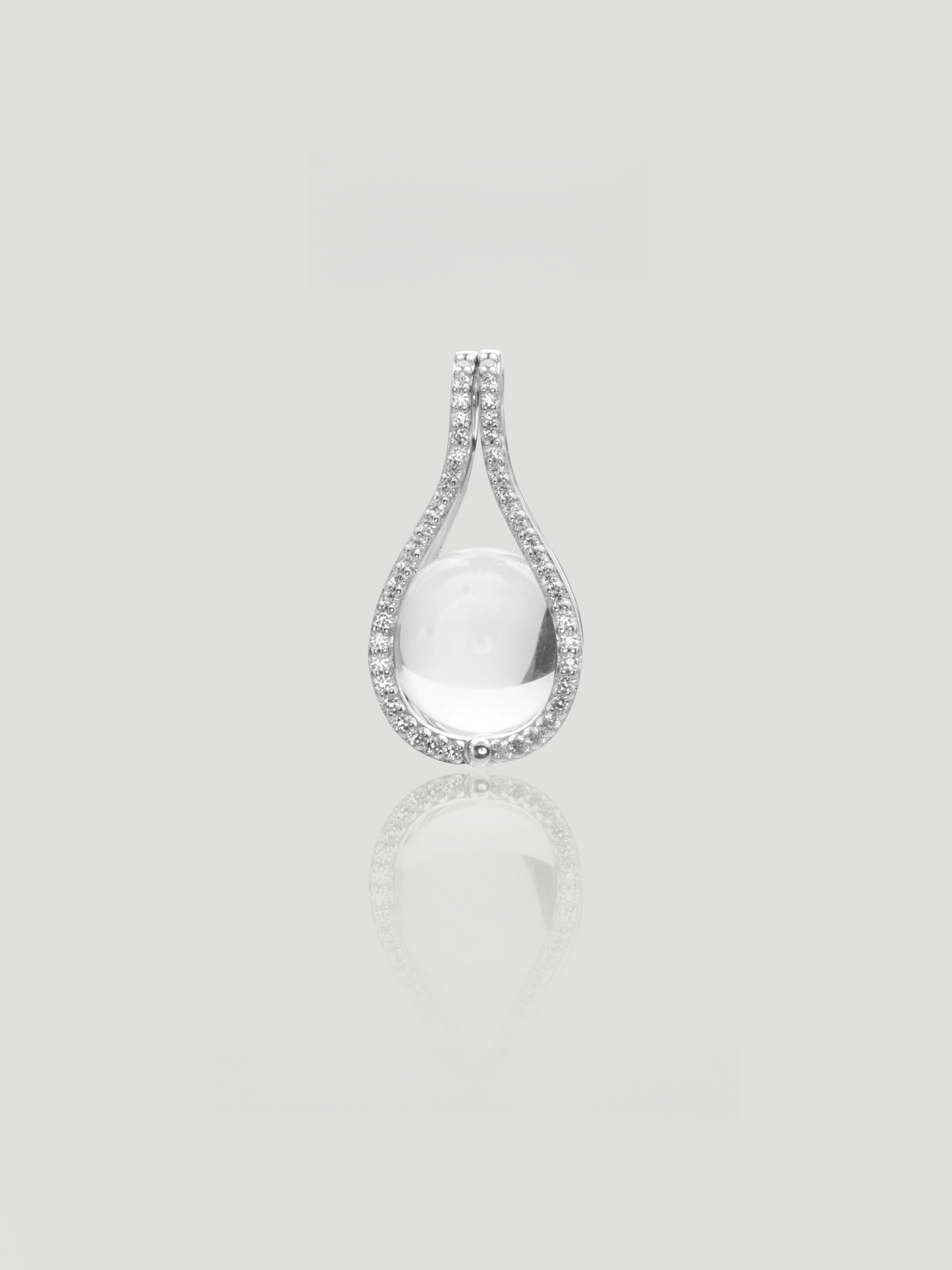 CARV. silver teardrop white crystal pendant with pavé outline and open drop design