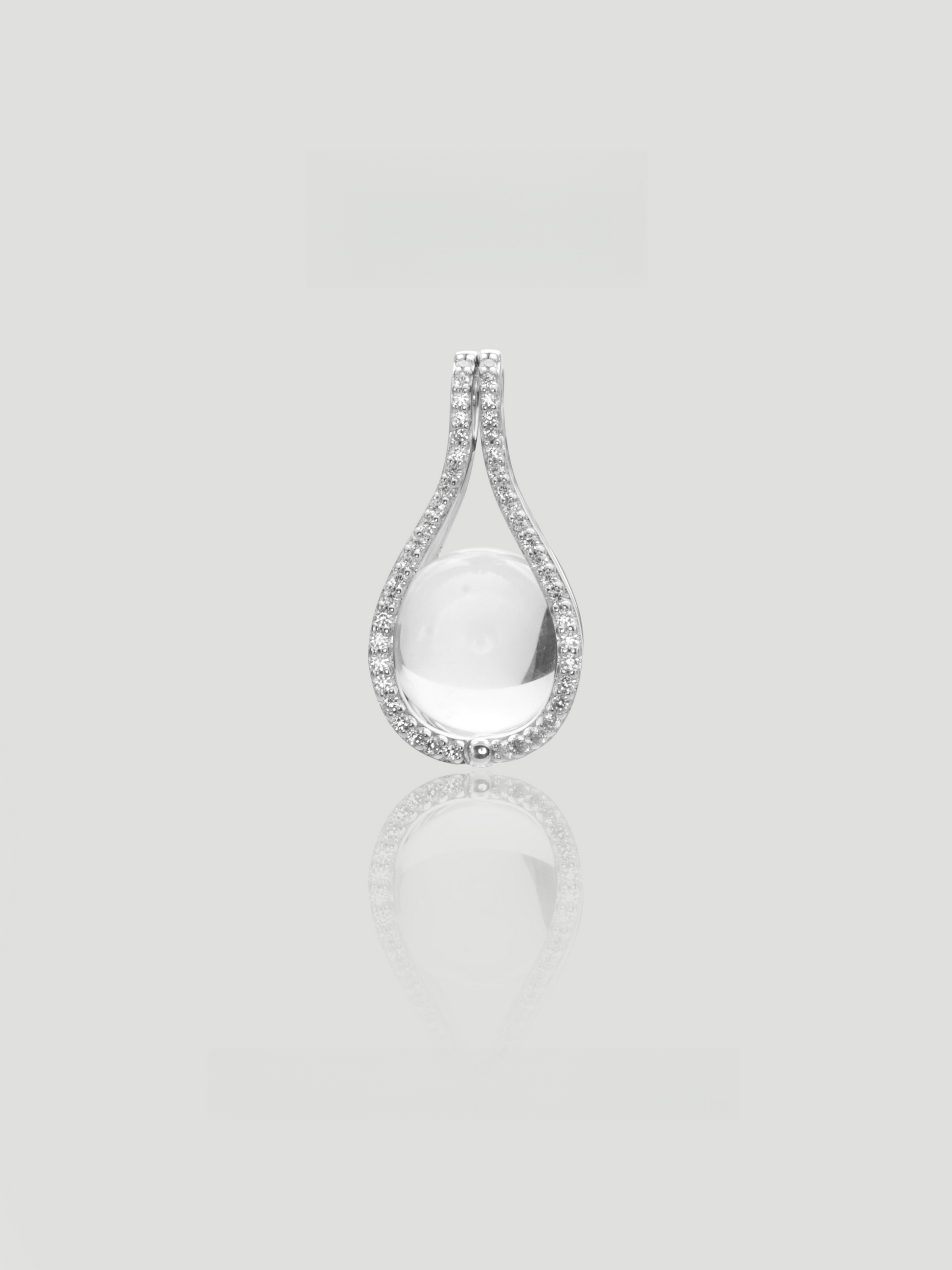 CARV. silver teardrop white crystal pendant with pavé outline and open drop design