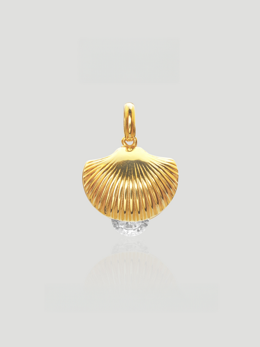 CARV. gold shell pendant necklace with textured fan shell charm and clear crystal accent product close-up