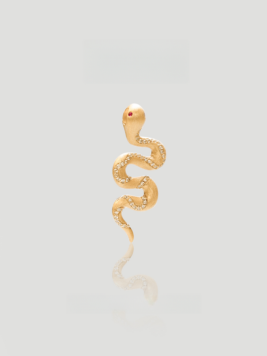CARV. gold snake pendant necklace with textured serpent charm, fine chain and red eye detail
