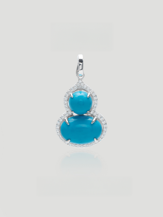 CARV. silver turquoise gourd pendant with double blue stones and pavé halo setting