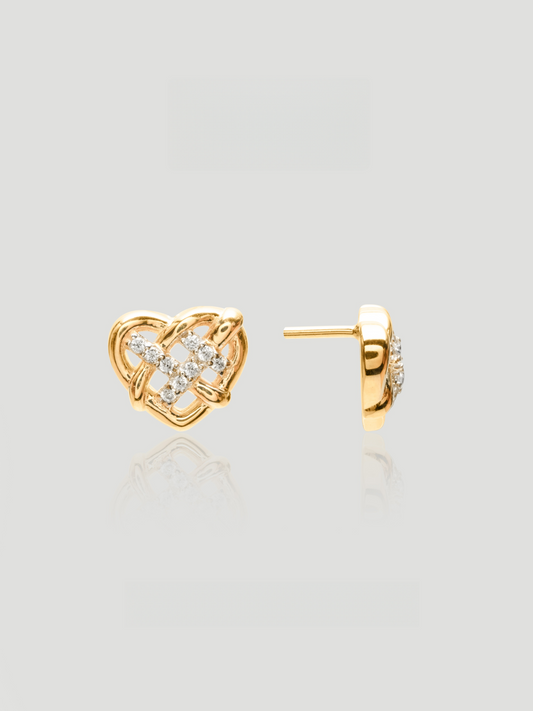 CARV. gold heart stud earrings with crystal knot detail and pavé stone setting product close-up