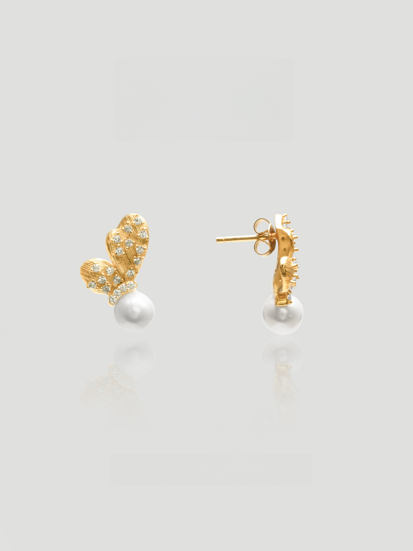 CARV. gold pearl floral stud earrings with pavé petals, round pearl drop and post back