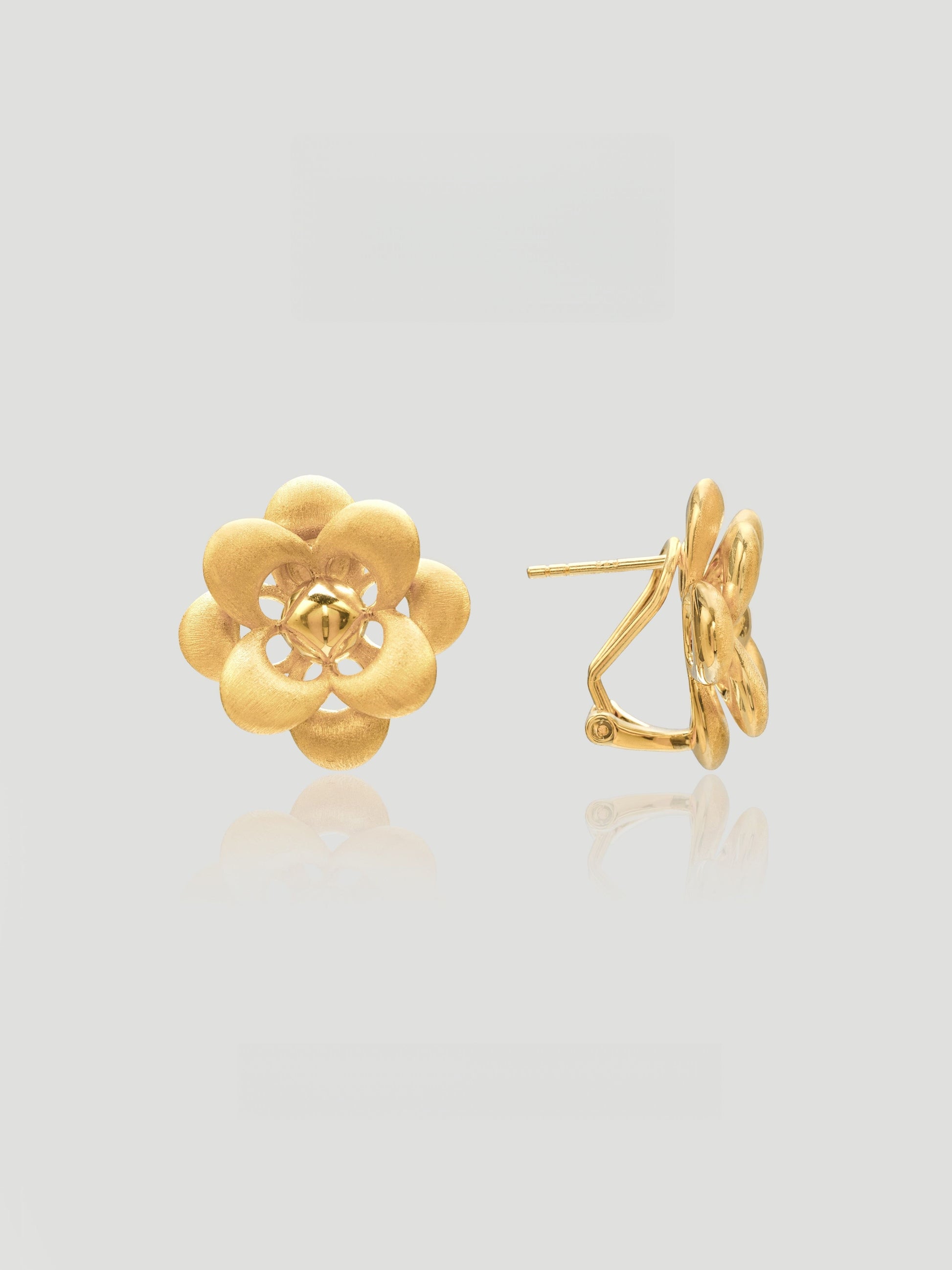 CARV. gold flower stud earrings with layered petal design and sculptural floral center