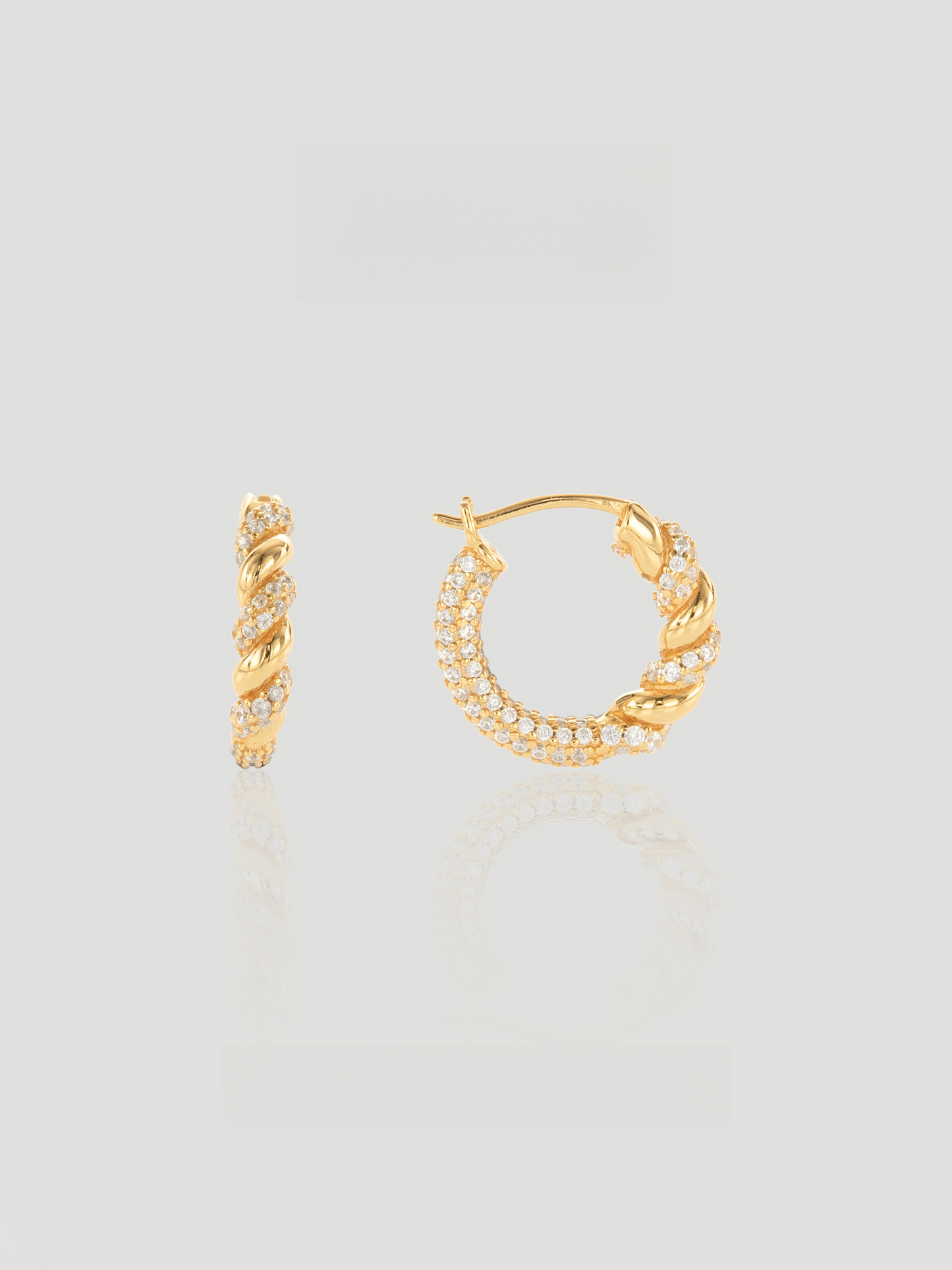 CARV. gold twisted pavé hoop earrings with rope twist detail and round hoop silhouette