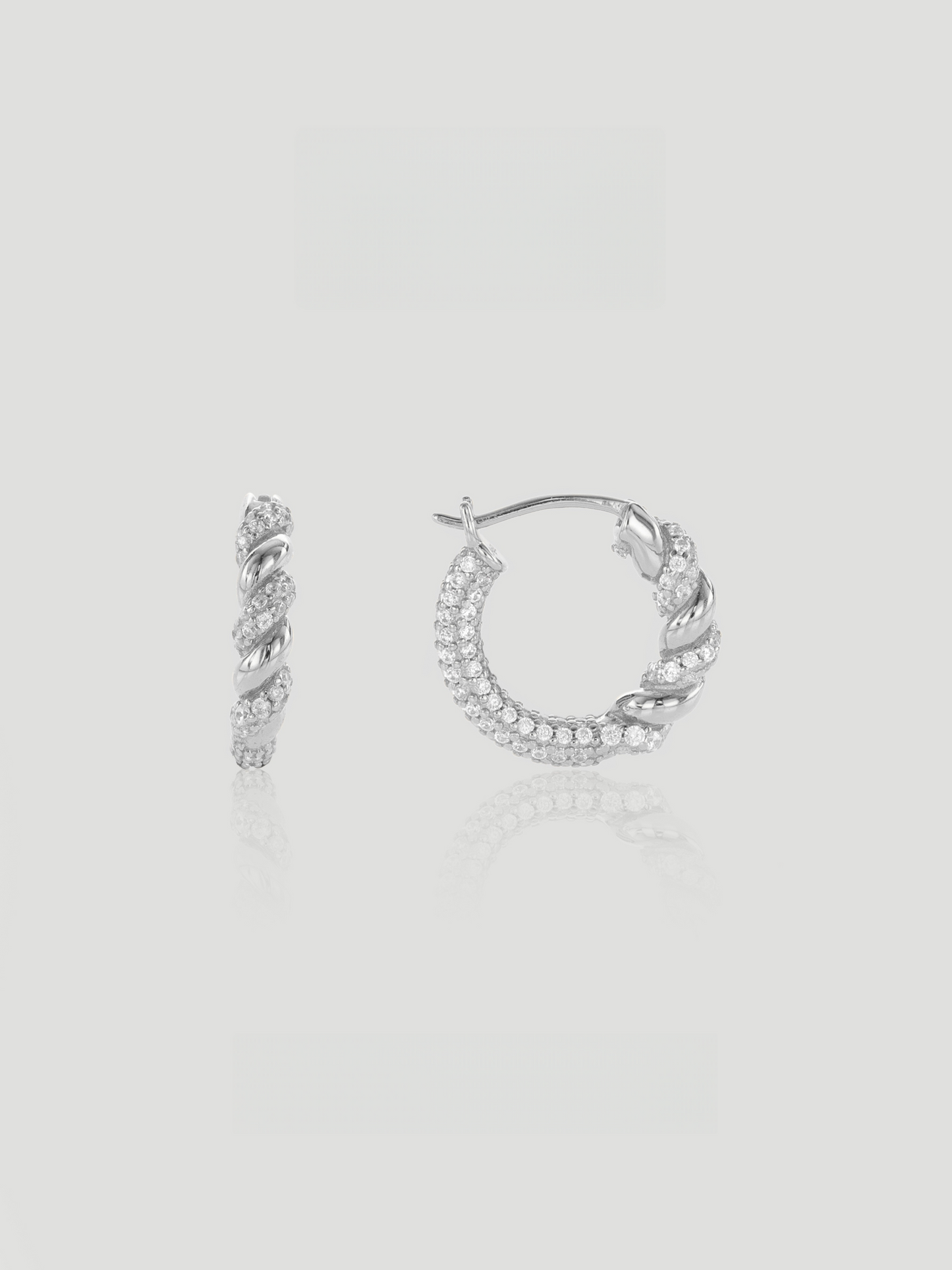 CARV. silver twisted pavé hoop earrings with rope twist detail and round hoop silhouette