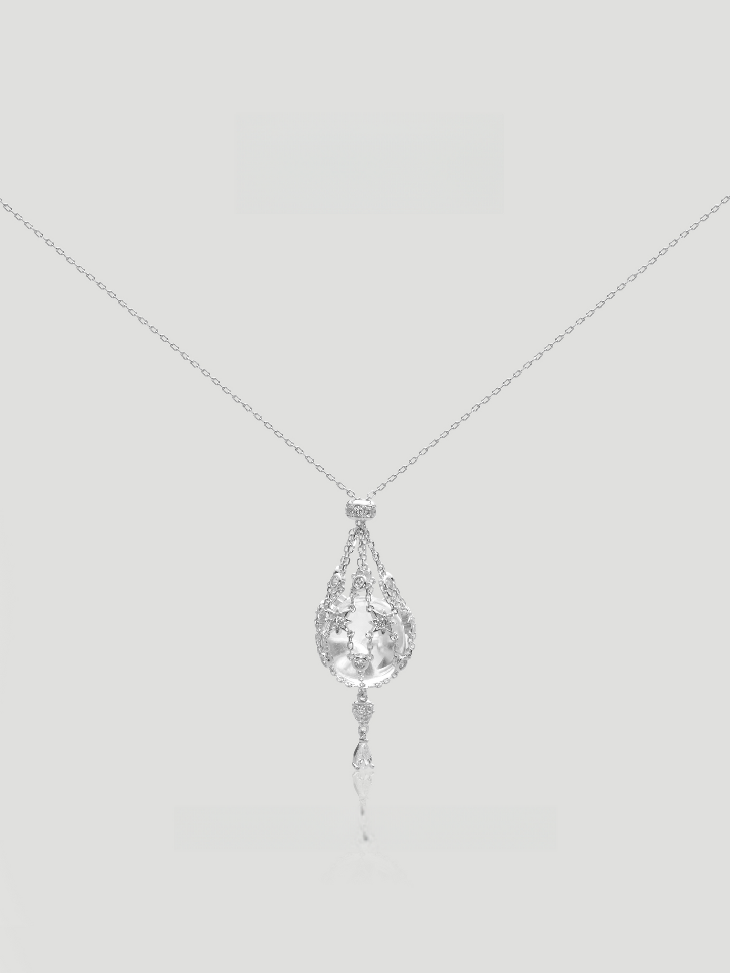 CARV. silver crystal cage pendant necklace with teardrop filigree pendant and delicate drop detail