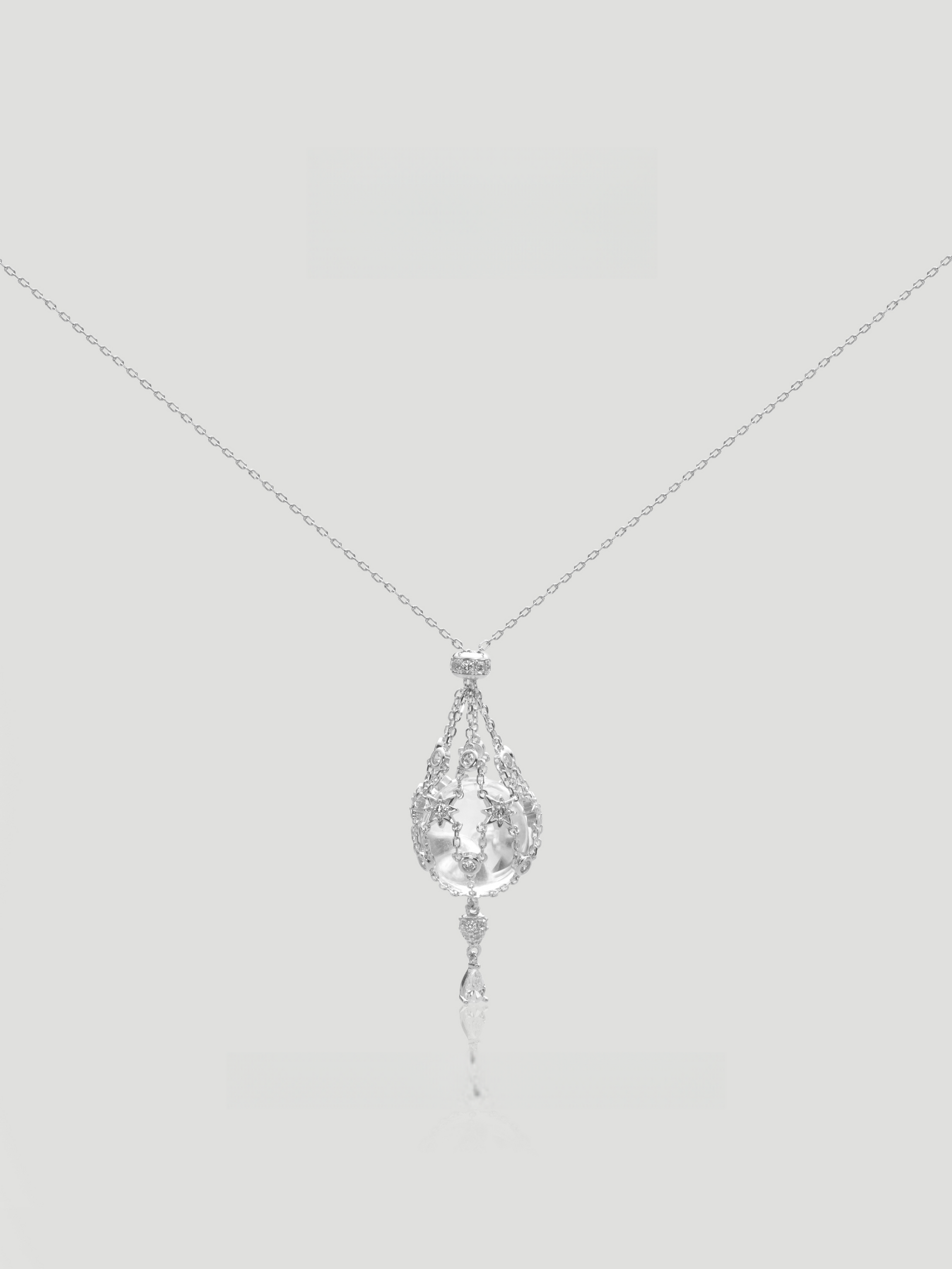 CARV. silver crystal cage pendant necklace with teardrop filigree pendant and delicate drop detail