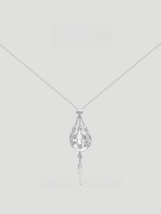CARV. silver crystal cage pendant necklace with teardrop filigree pendant and delicate drop detail