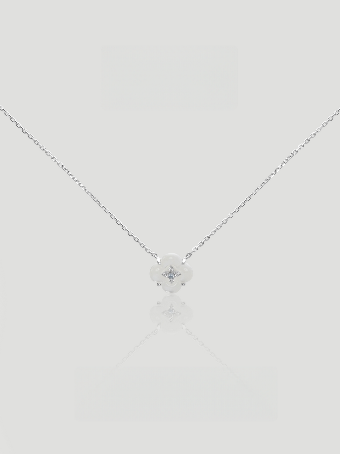 CARV. silver mother-of-pearl flower necklace with white floral pendant and crystal centre detail