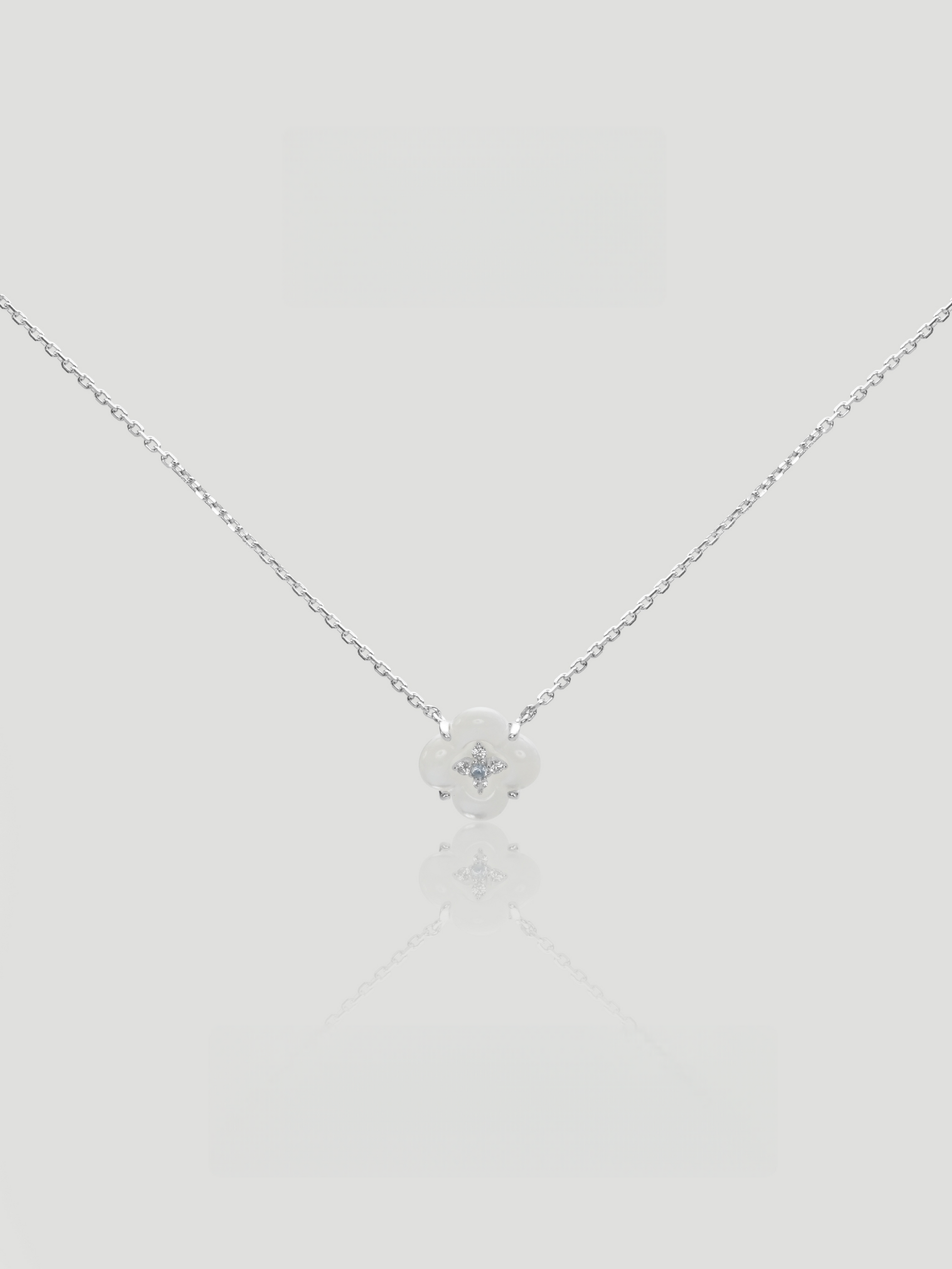 CARV. silver mother-of-pearl flower necklace with white floral pendant and crystal centre detail