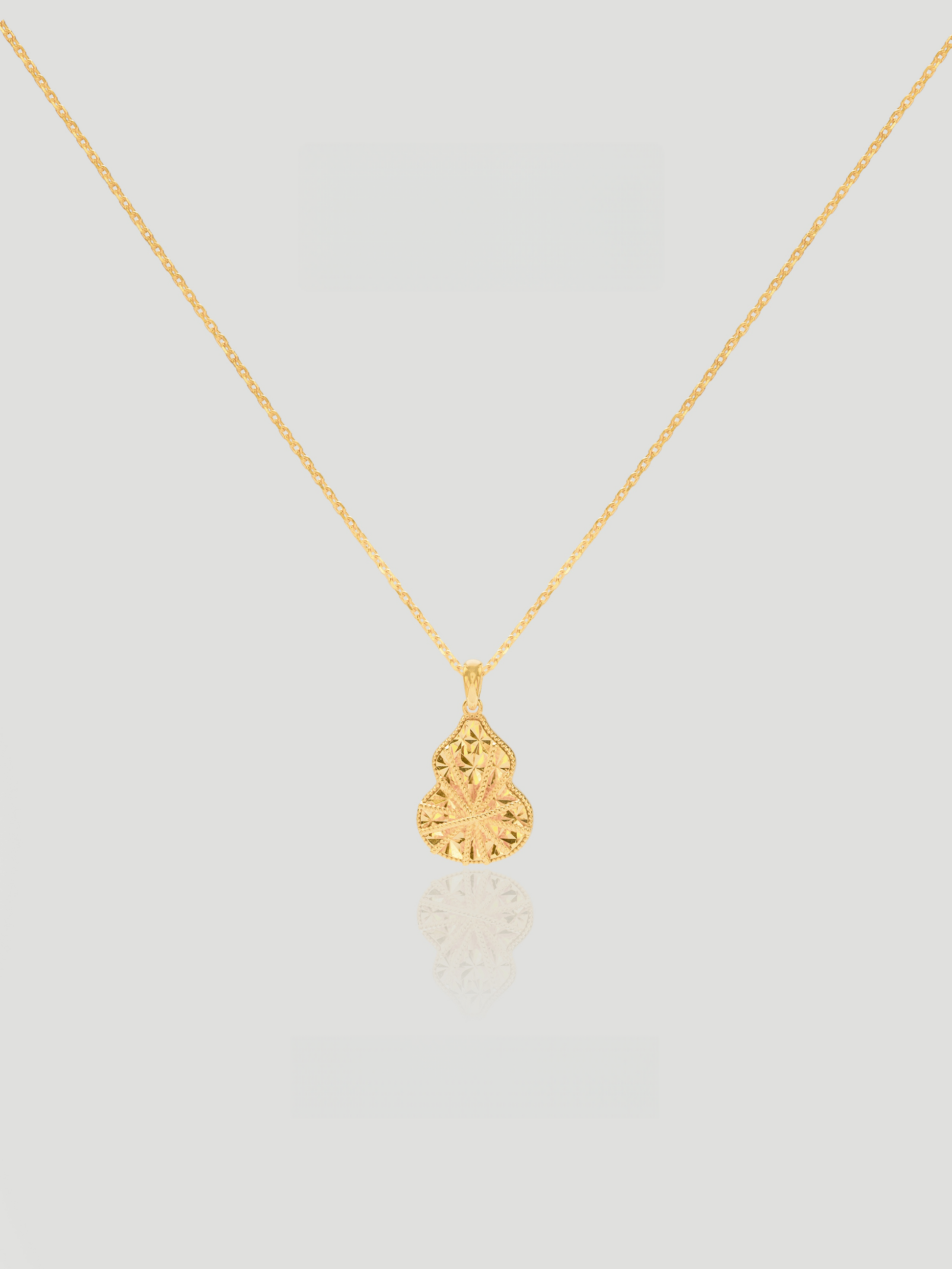 CARV. gold filigree gourd pendant necklace with engraved drop pendant product close-up