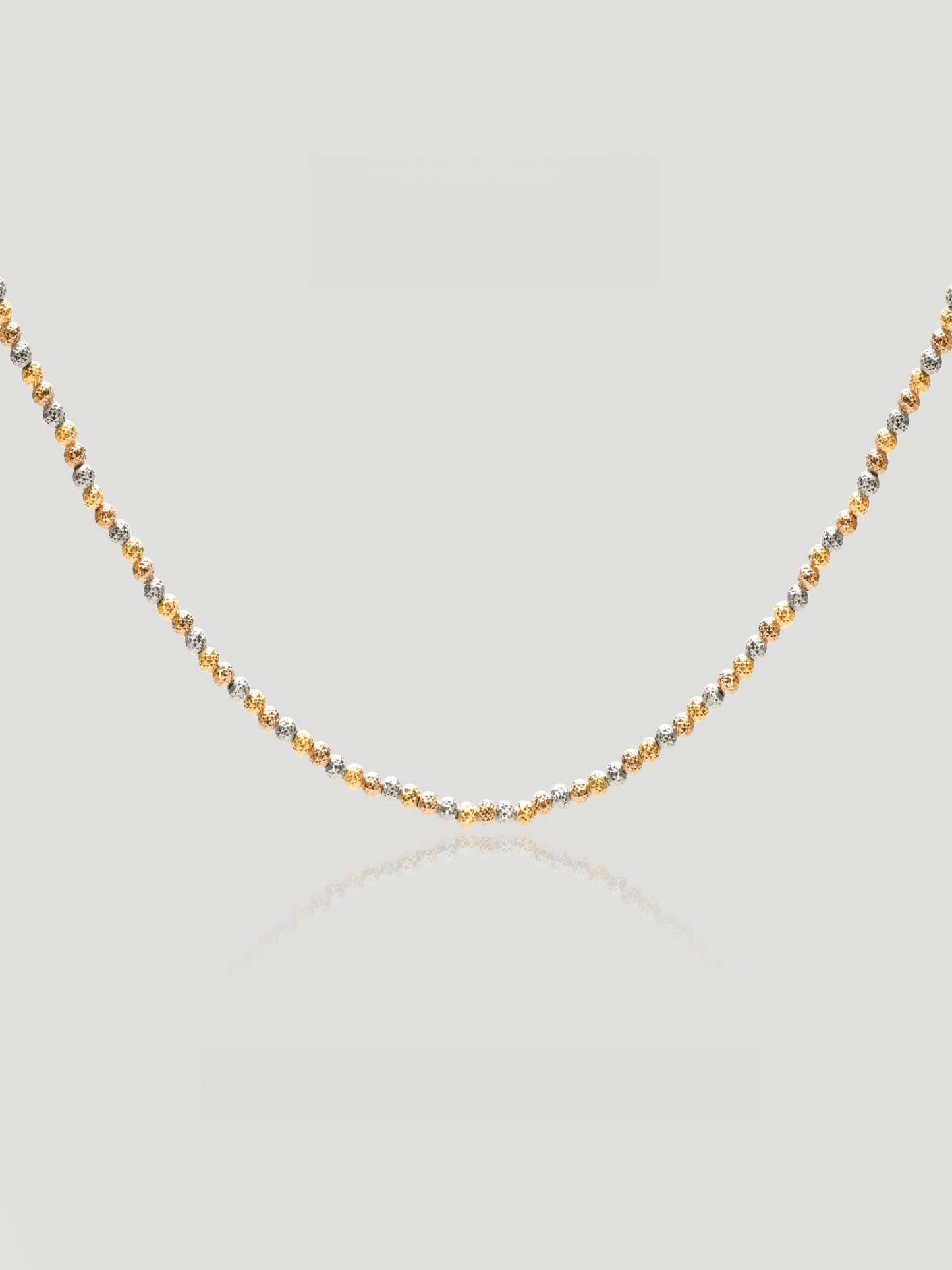 CARV. tri-tone beaded chain necklace with gold, silver and warm metallic bead detail