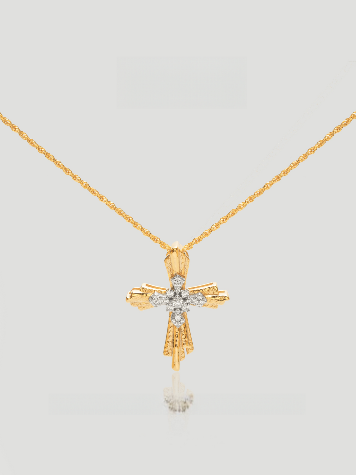 CARV. mixed-tone cross pendant necklace with gold chain, silver crystal cross and textured gold bars