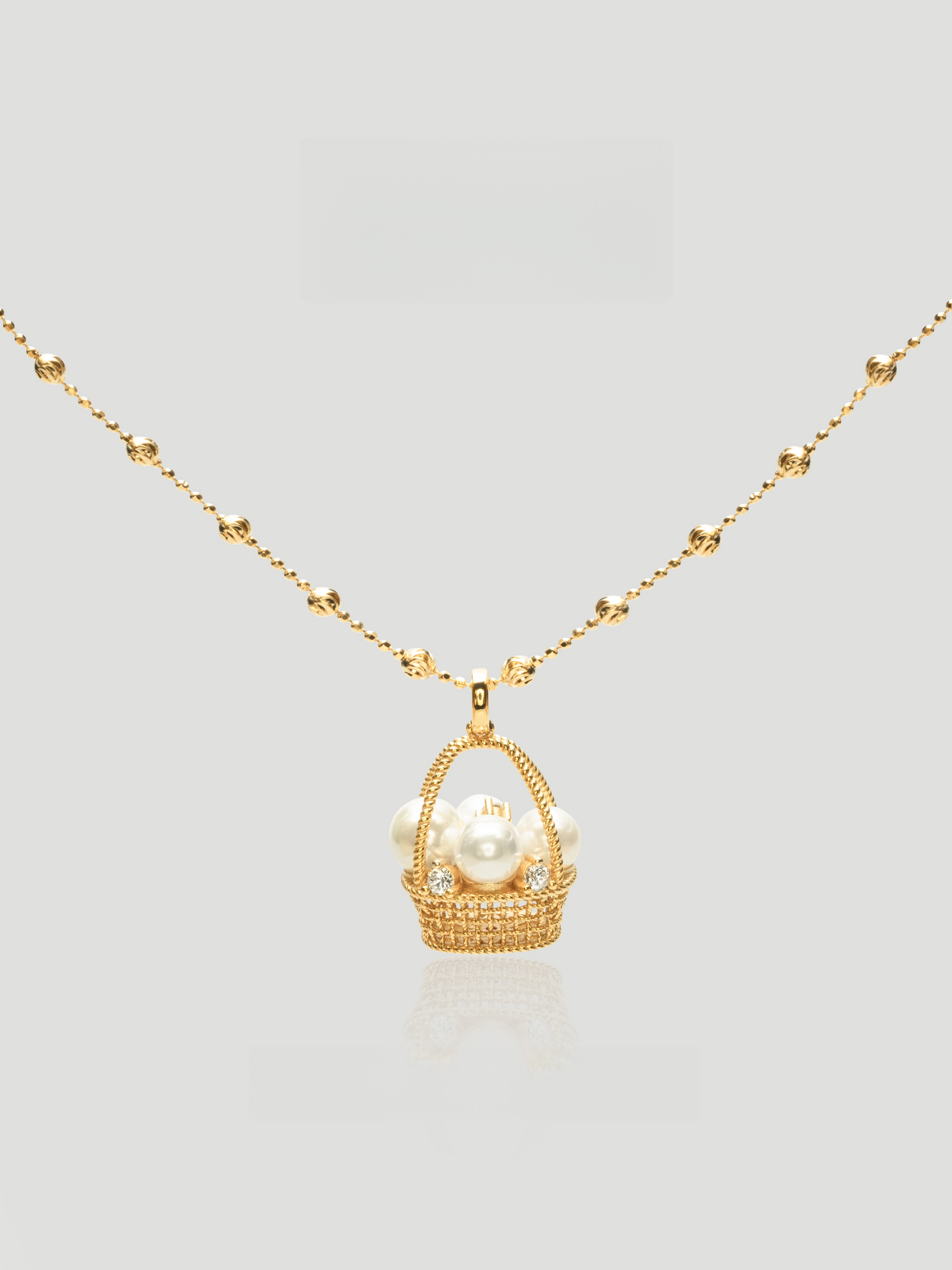 CARV. gold pearl basket necklace with pearl pendant, crystal accents and beaded chain