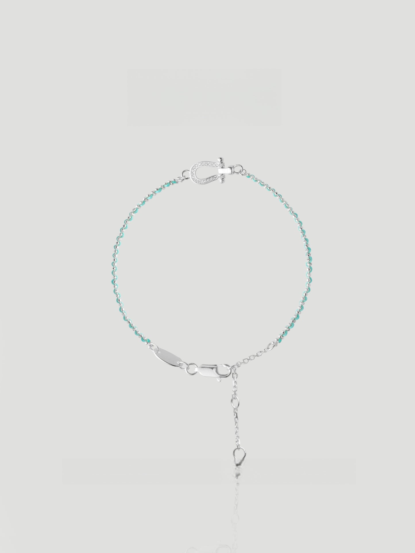 CARV. turquoise beaded bracelet with silver bar accent, fine chain and adjustable drop detail