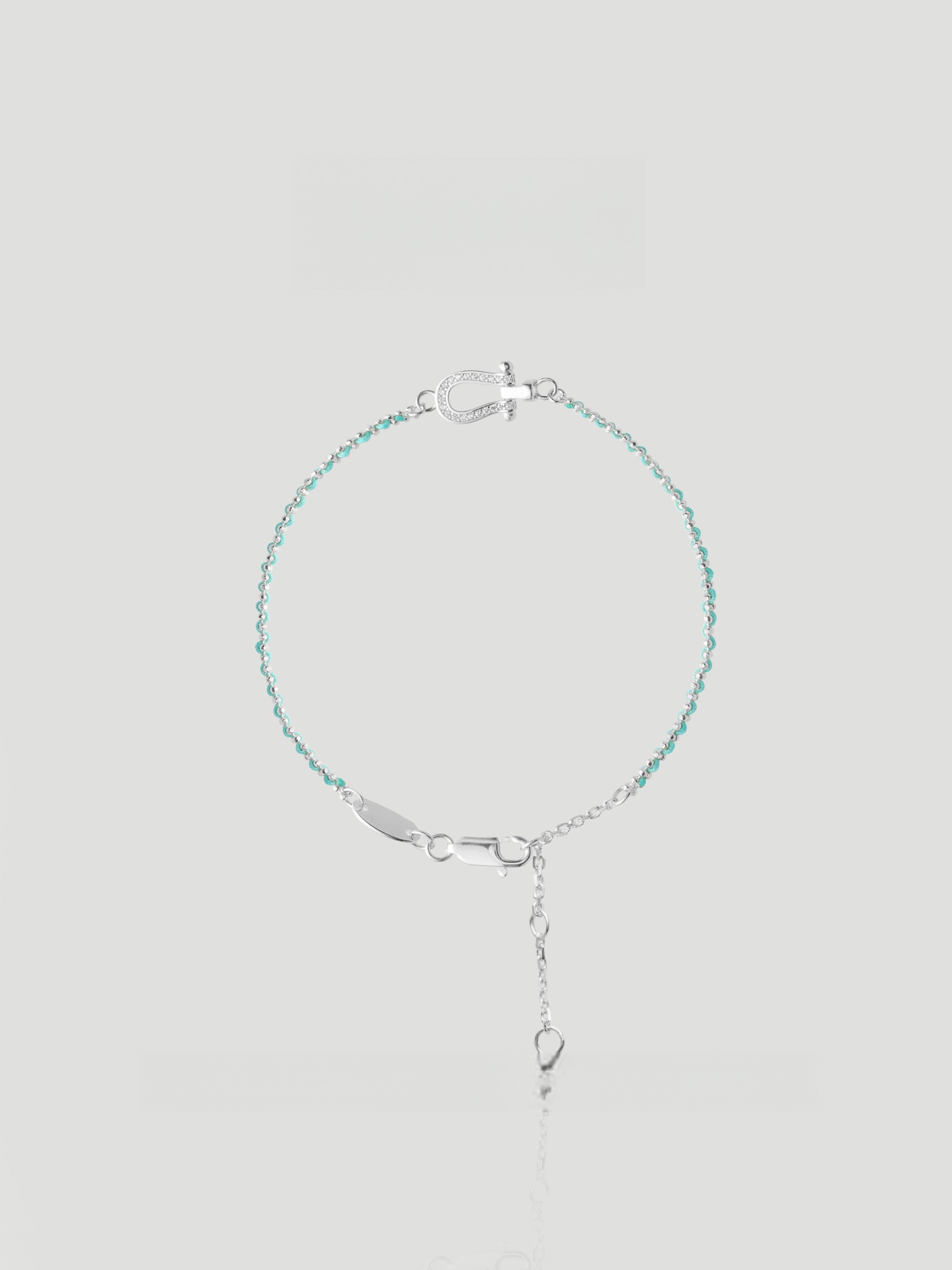 CARV. turquoise beaded bracelet with silver bar accent, fine chain and adjustable drop detail