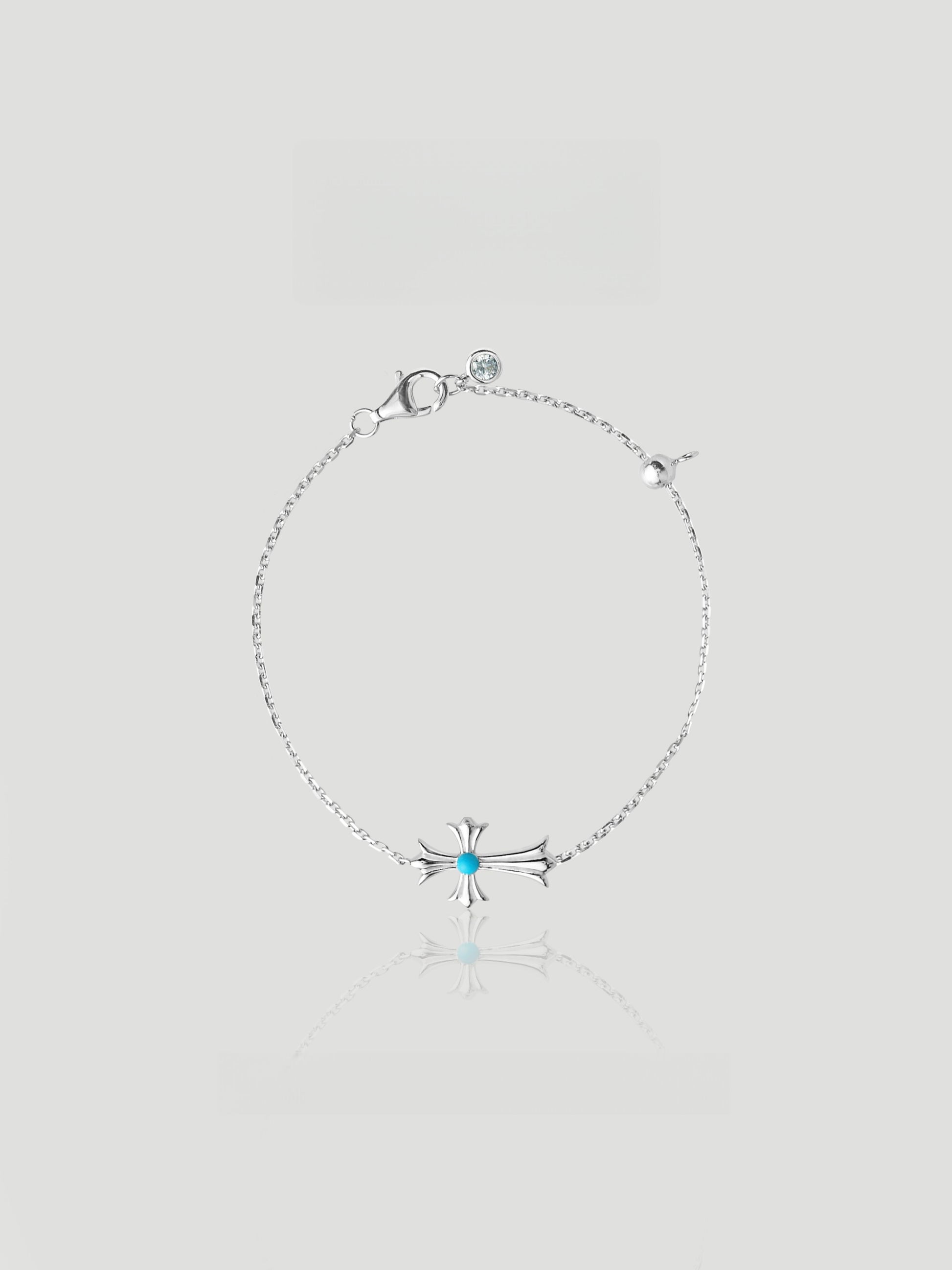 CARV. silver cross bracelet with turquoise centre accent, fine chain and small round charm