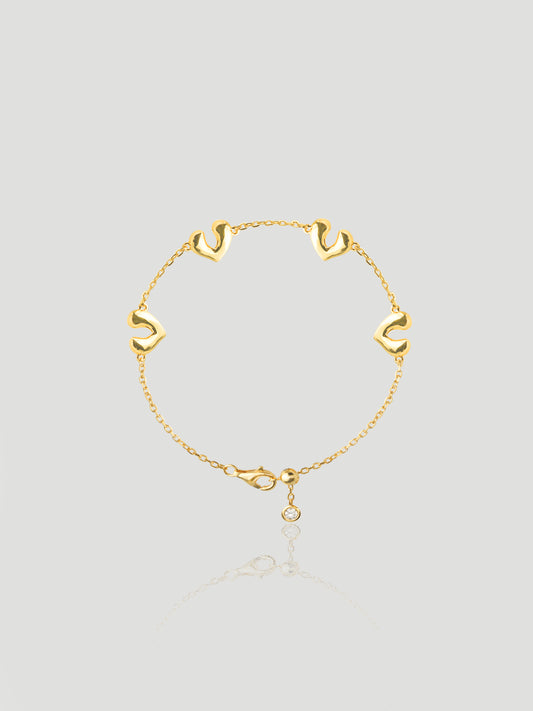 CARV. gold open heart charm bracelet with delicate chain links and a round drop charm