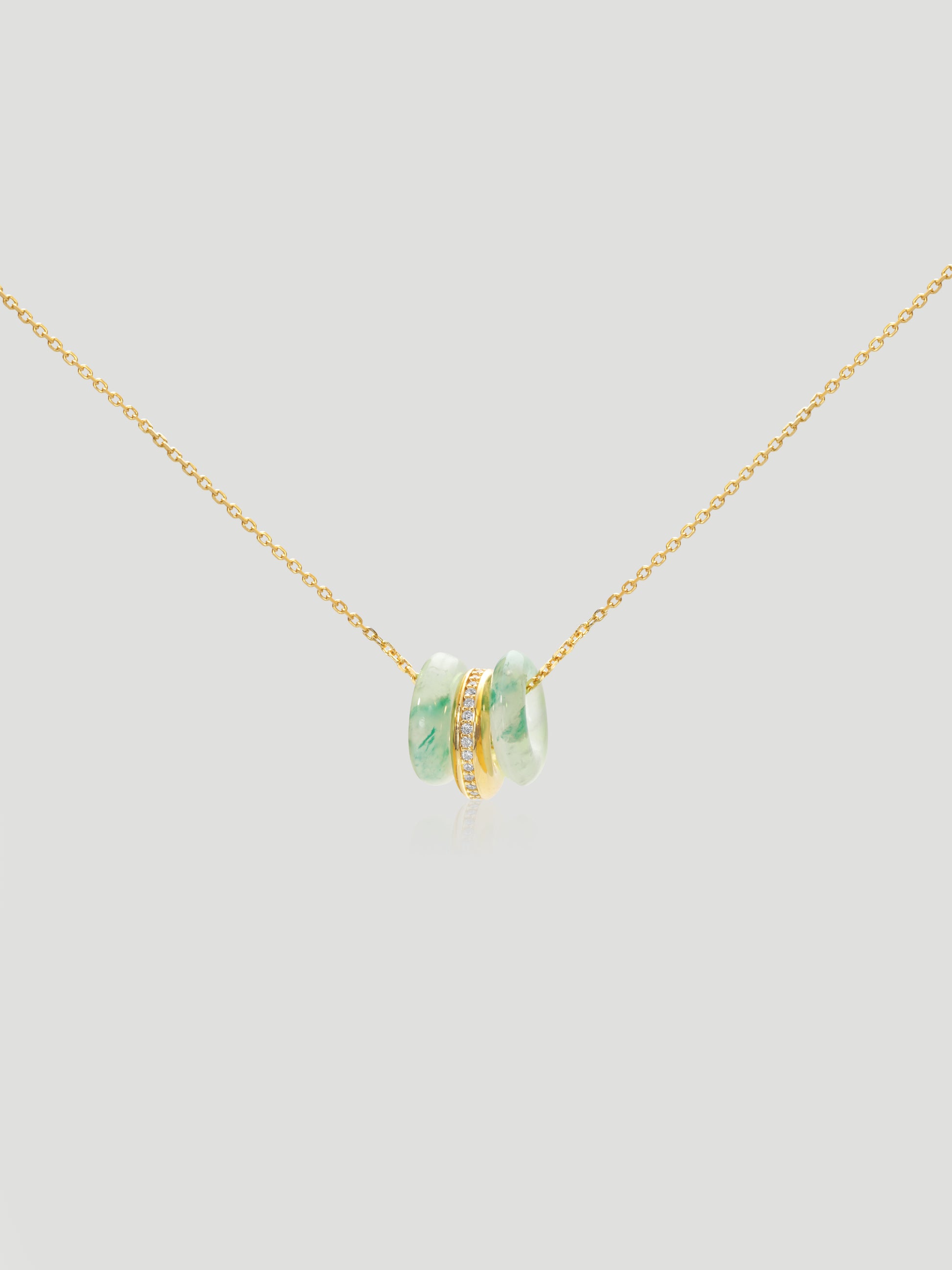 CARV. gold green stone orbit pendant necklace with triple hoop design and pavé center ring