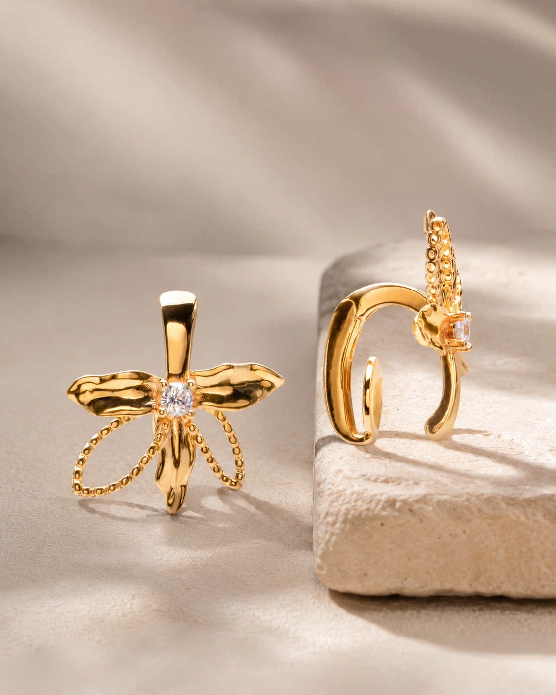 CARV. gold bow hoop earrings with sculptural bow shape and pavé crystal detail product display