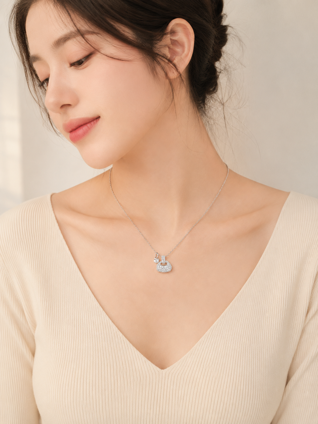 CARV. silver pavé dome pendant necklace worn at collarbone with fine chain