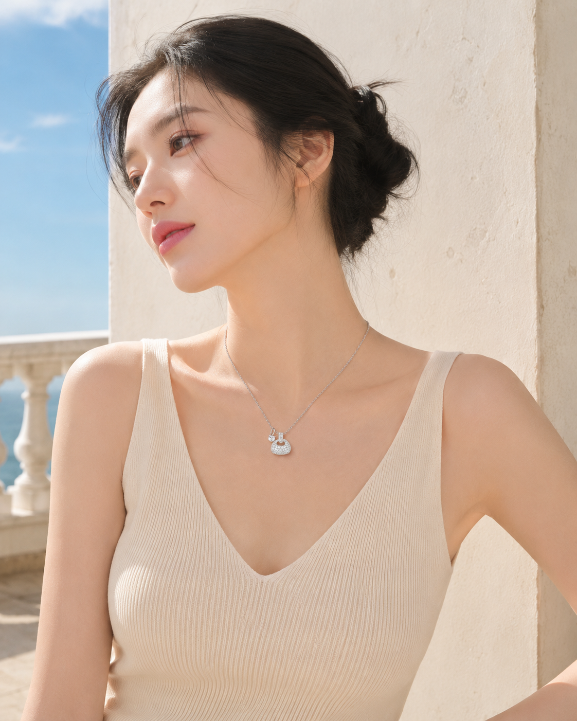 CARV. silver pavé dome pendant necklace worn at collarbone with round pavé pendant