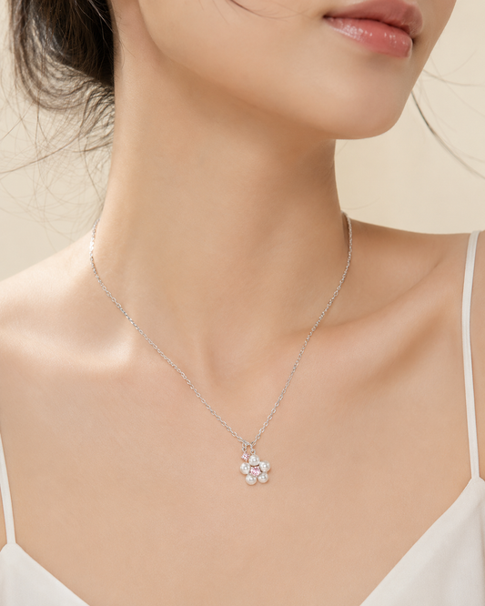 CARV. silver pearl cluster necklace worn at collarbone with pearl bead pendant and fine chain