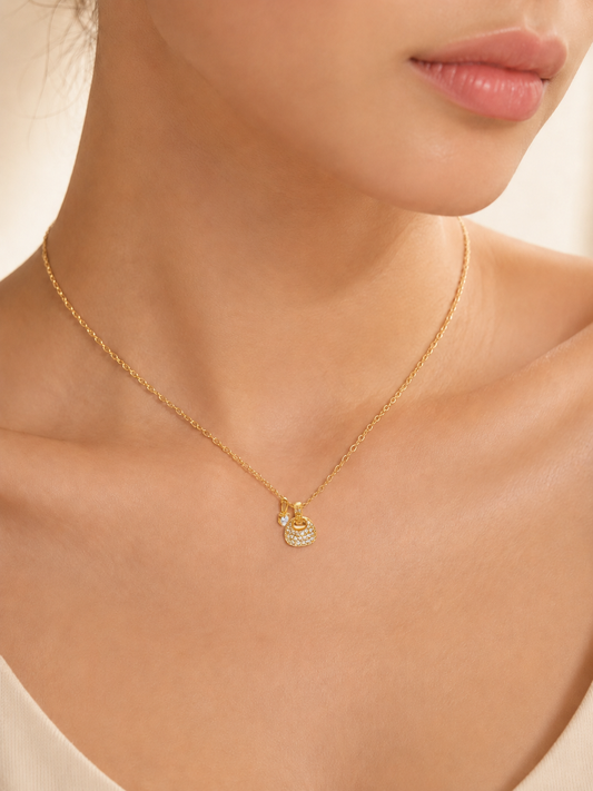 CARV. gold pavé dome pendant necklace worn at collarbone with round crystal dome charm