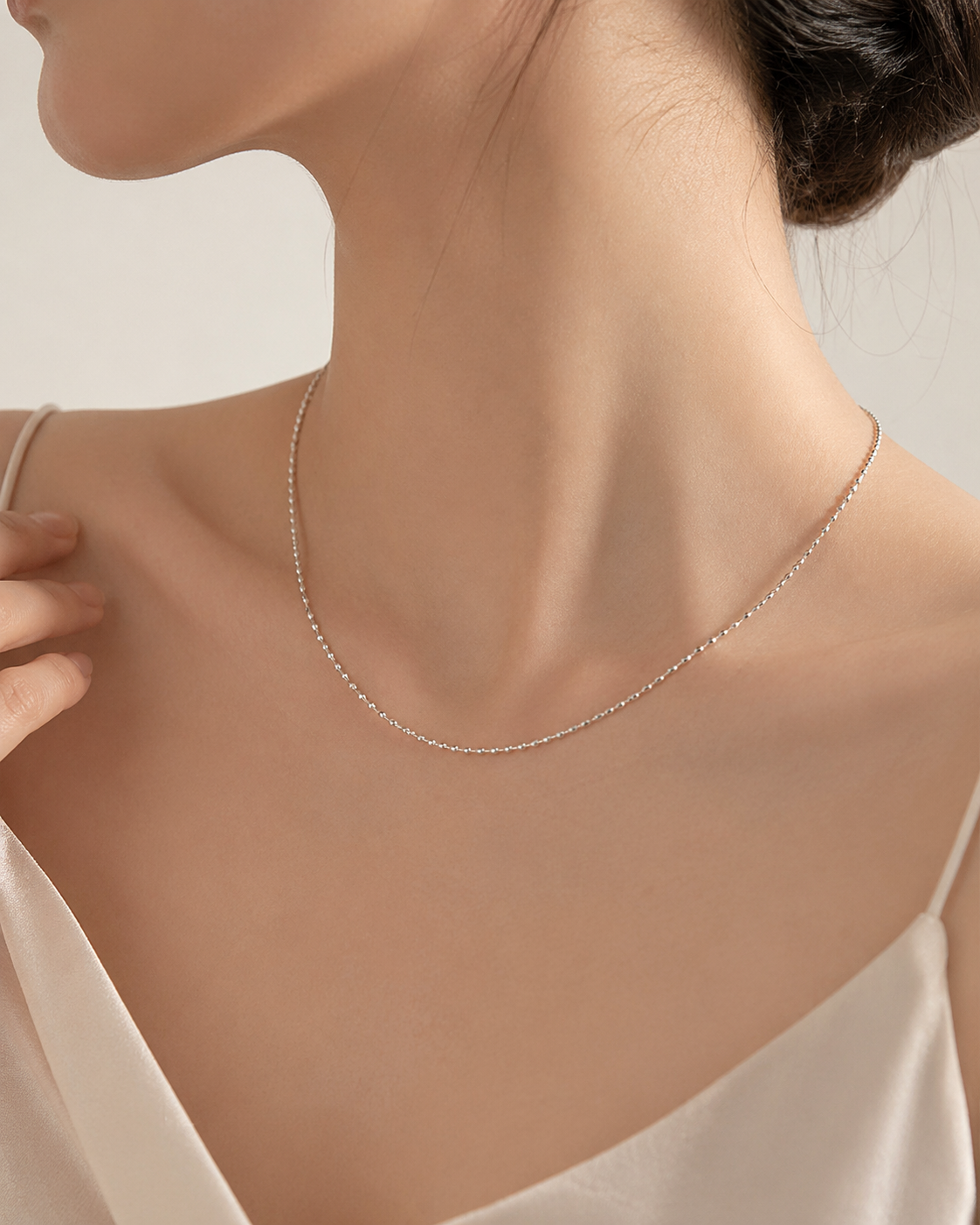 CARV. silver minimalist single chain necklace worn at collarbone with fine chain detail