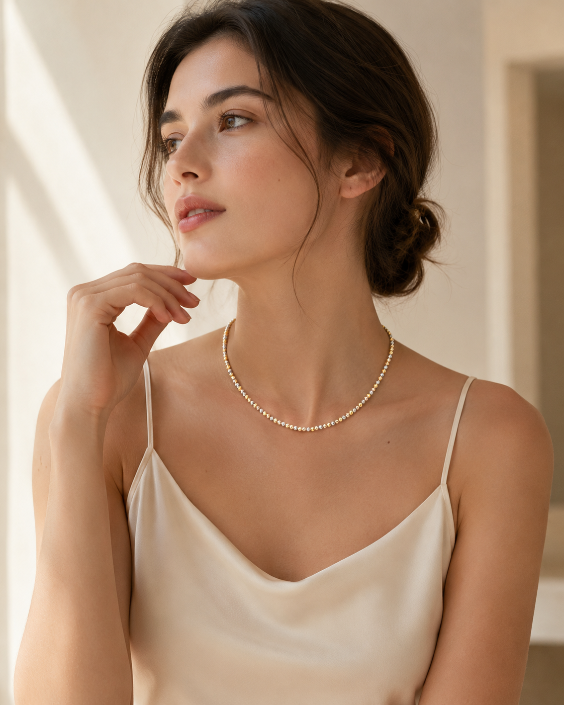 CARV. tri-tone beaded chain necklace styled on neckline with fine mixed bead design
