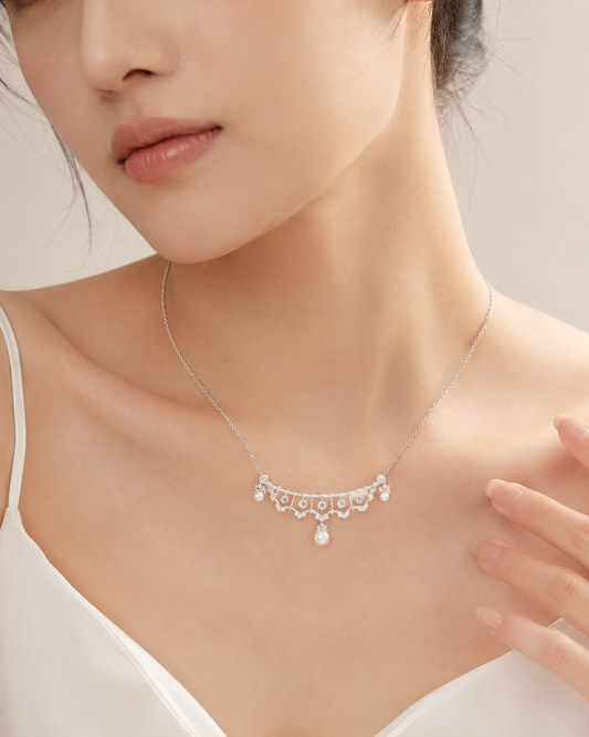 CARV. silver lace pearl necklace with scalloped fringe worn on neckline