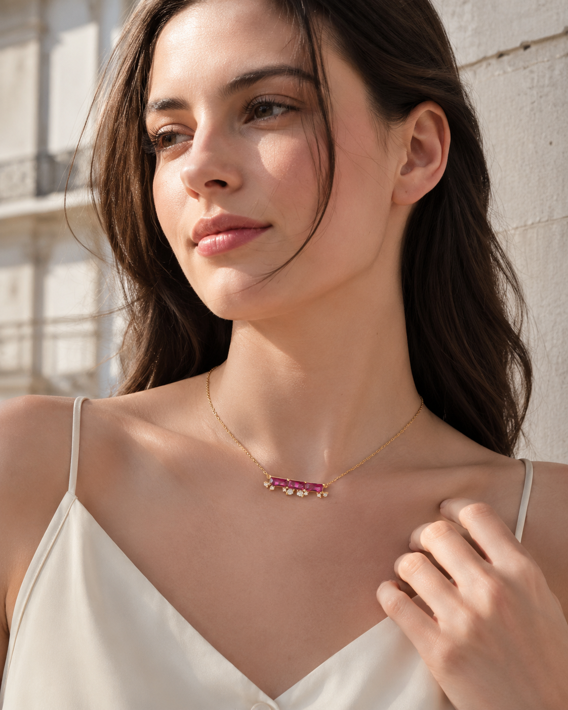 CARV. ruby bar necklace worn at collarbone with gold chain and slim pink stone pendant
