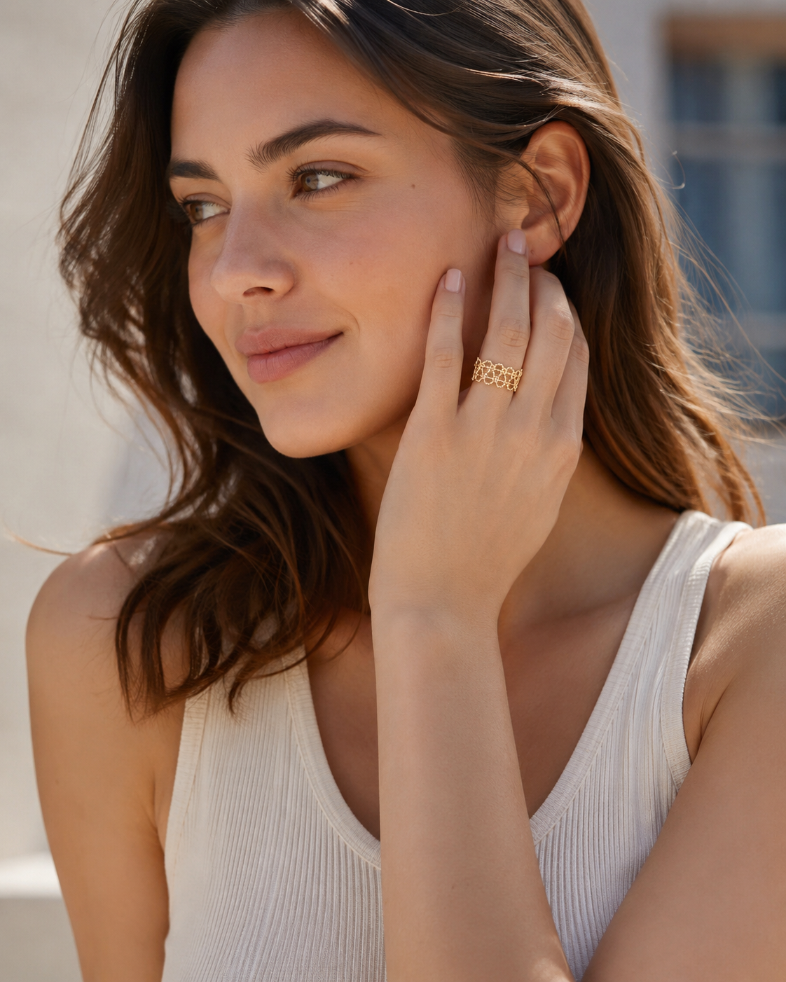 CARV. gold open lace ring worn with a white top for minimal outfit styling