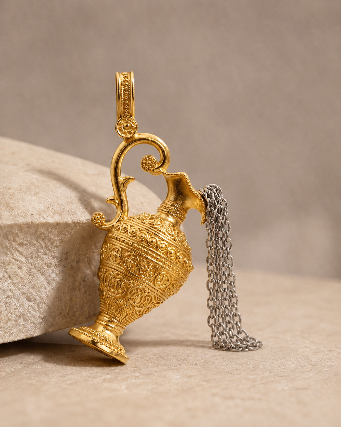 CARV. two-tone ewer pendant necklace with textured gold vessel charm and silver tassel product display