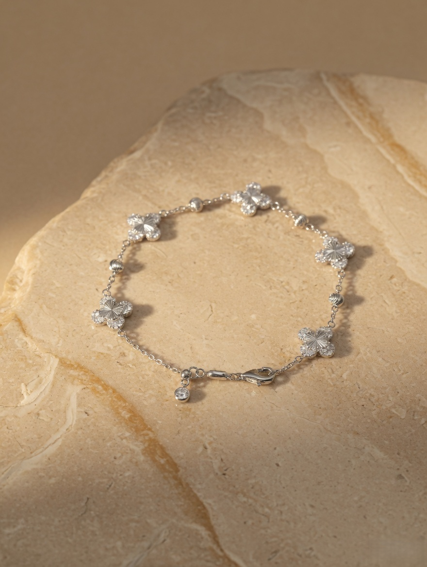 CARV. silver clover bracelet with crystal clover charms, round bead accents and chain detail product display