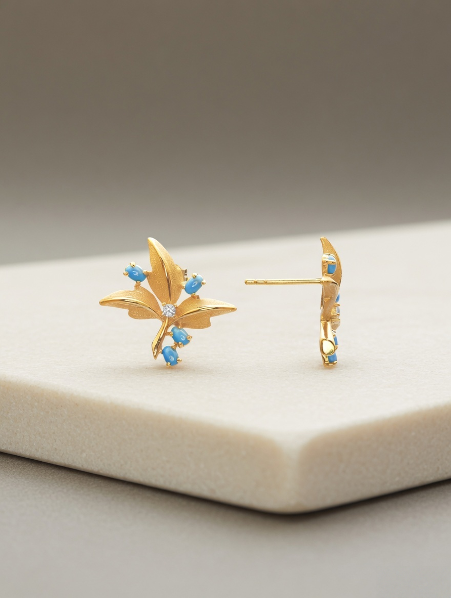 CARV. gold turquoise floral stud earrings with blue stones product display